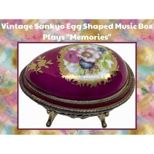 Vintage Sankyo Egg Shaped Music Box Plays "Memories" see video)‎